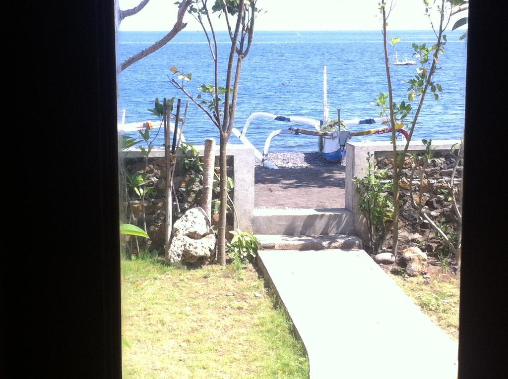 Amed Sari Beach Guesthouse Esterno foto