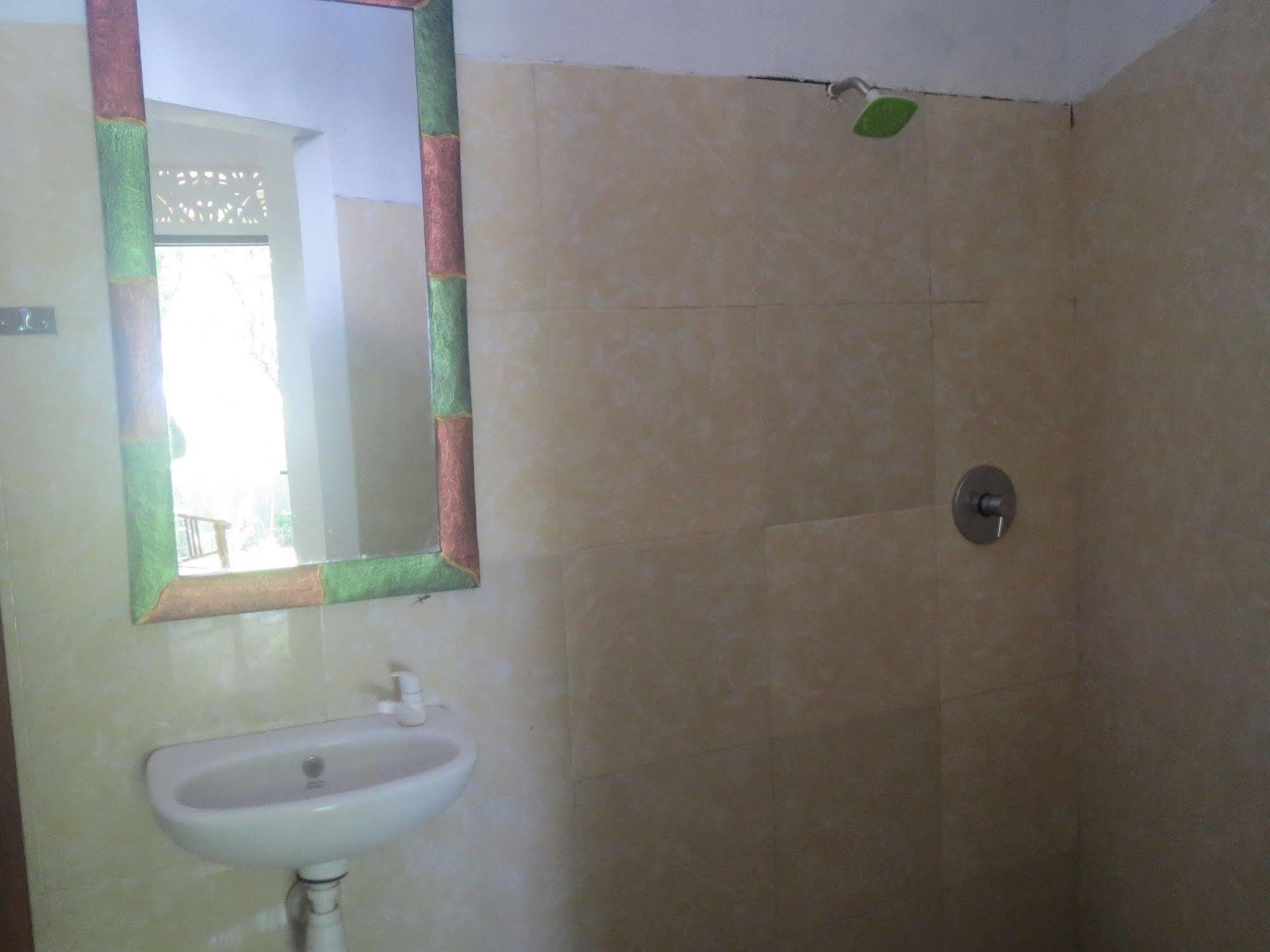 Amed Sari Beach Guesthouse Esterno foto